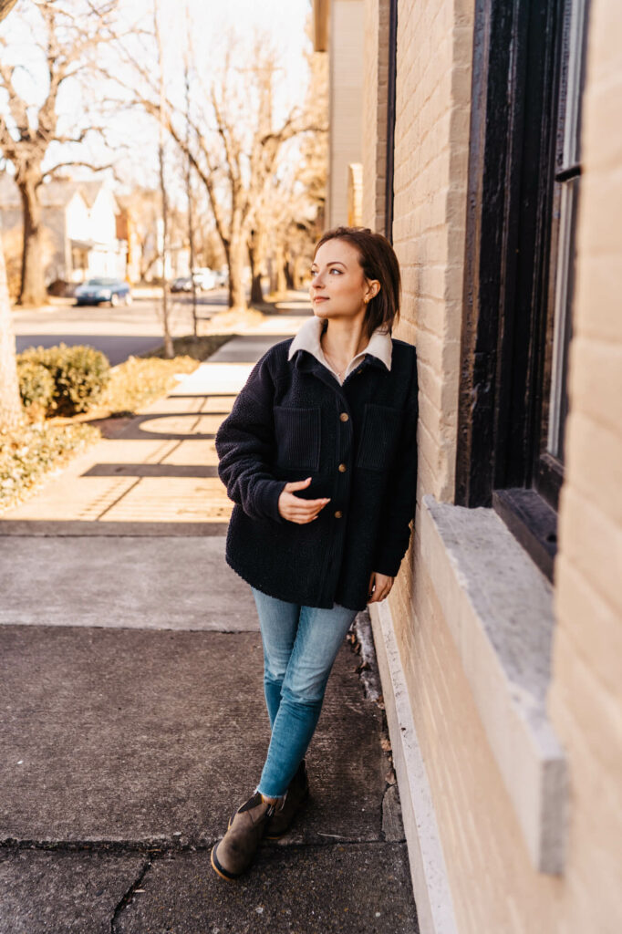 Woman walking on sidewalk