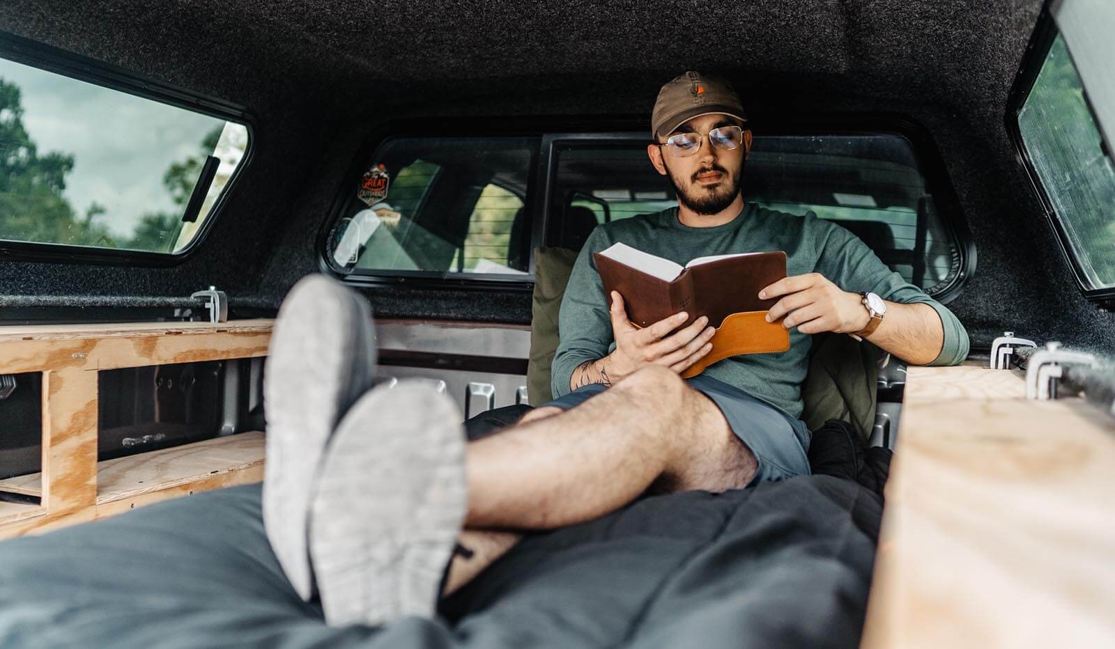 Drake, Our new designer sitting in his truck